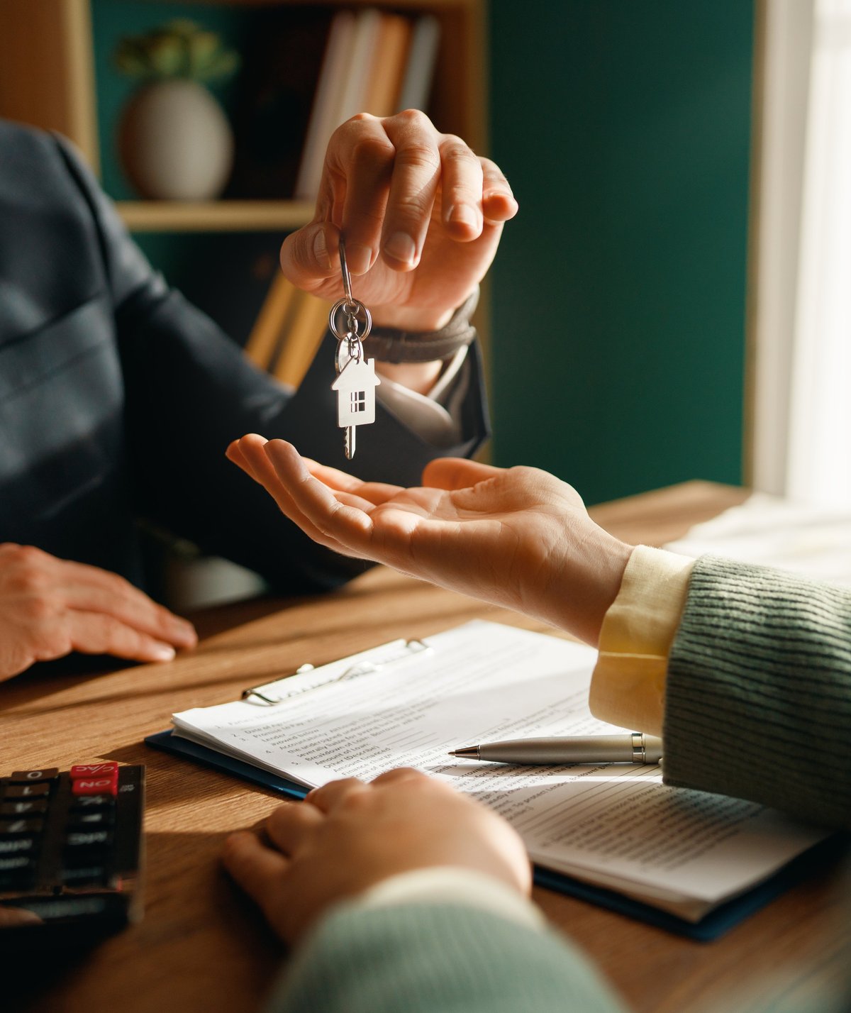 Real estate contract sign. Property mortgage finance signing agreement approved.